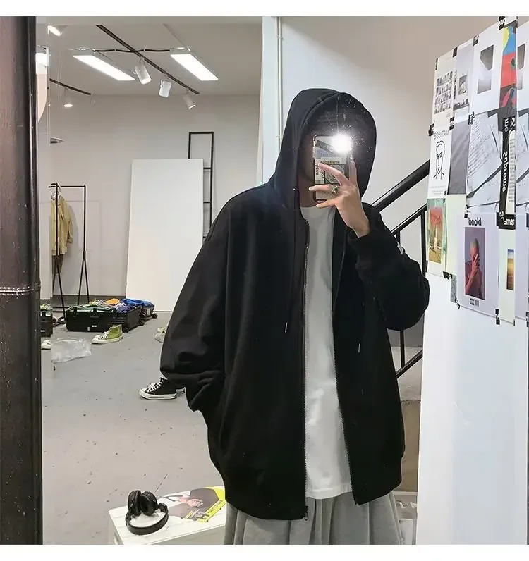 DELTOSTINSS Urban Oversized Hooded Jacket – Minimal Black Streetwear Essential